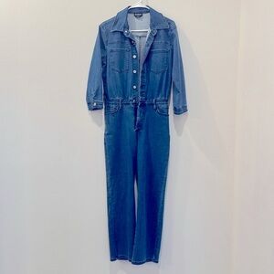 Never worn Bebe denim jumpsuit size M